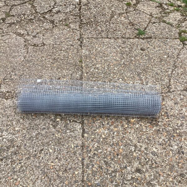 Galvanized welded mesh roll for garden fencing and DIY projects.