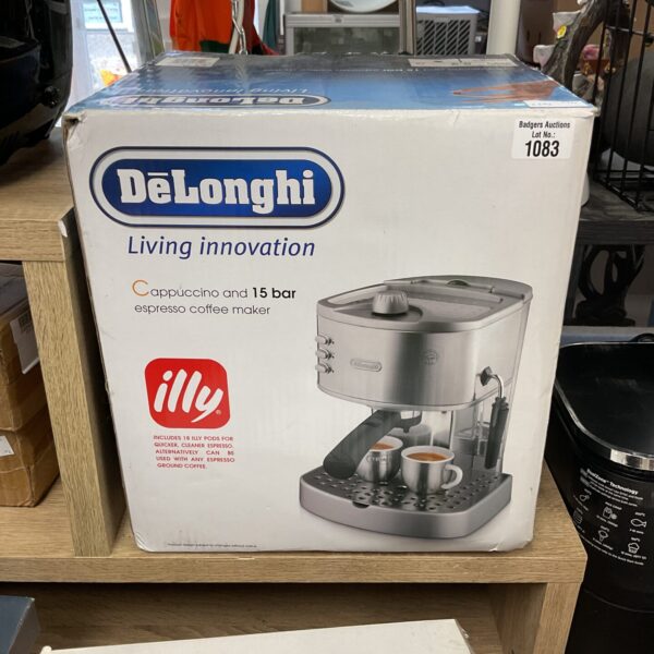 Front view of a vintage Delonghi espresso machine.