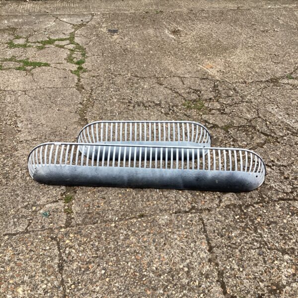 Pair of vintage metal flower troughs for wall mounting.