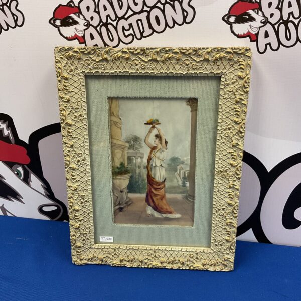 Antique painting on glass of a Greek maiden in a gilded frame.