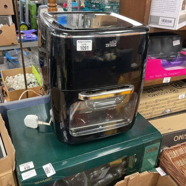 Front view of a used Starlyf air oven kitchen appliance.