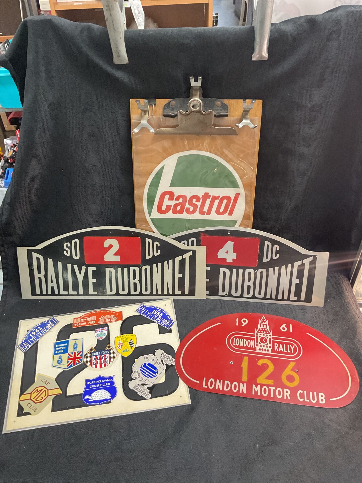 825 Motor racing time keepers board and four car rally plates