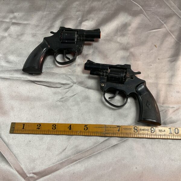 Lot of two vintage Detective Special cap guns, collectible toys.