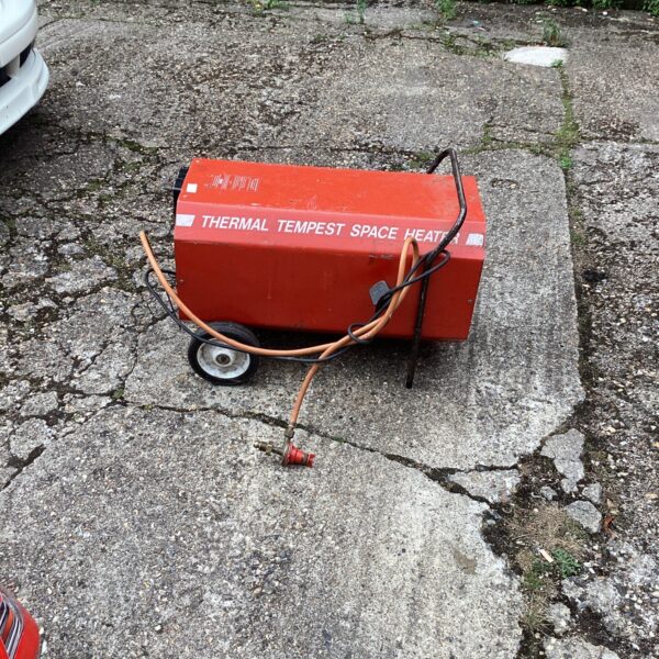 Vintage Tempest thermal space heater for workshop or garage use.