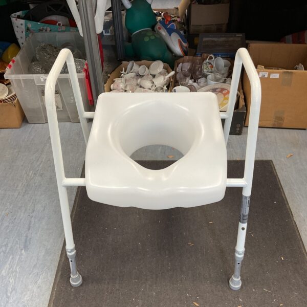 Used Aidapt toilet riser seat for bathroom support.