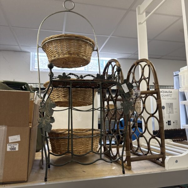Vintage wooden bottle rack with two shelves for display.