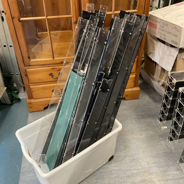 Lot of clear perspex display cases for model trains and collectibles.