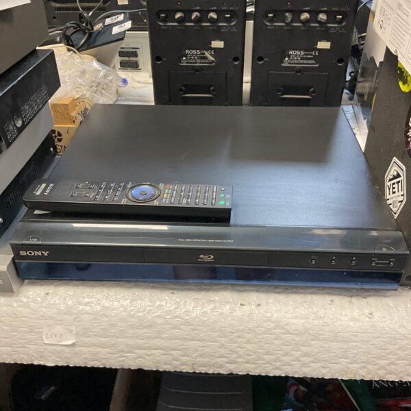 Sony BDP-S300 Blu-Ray player with remote control.