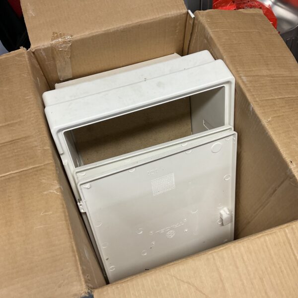 Used electrical meter box for wall mounting.