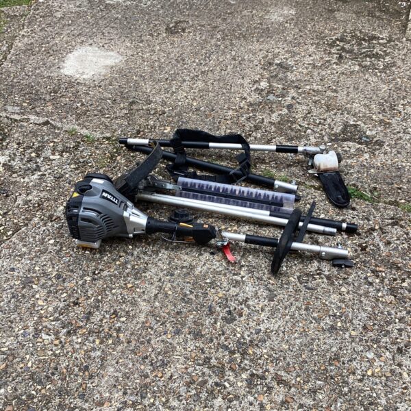 Titan petrol garden multi tool with attachments for versatile gardening.