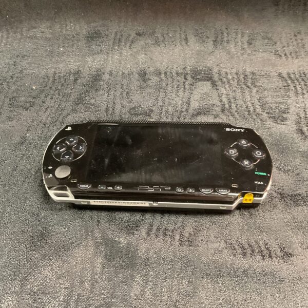 Silver Sony PSP-3000 handheld console for retro gaming.