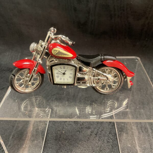 Red and chrome motorcycle desk clock, a unique novelty timepiece.