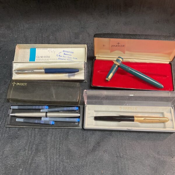 Vintage Parker fountain pen collection with original packaging.