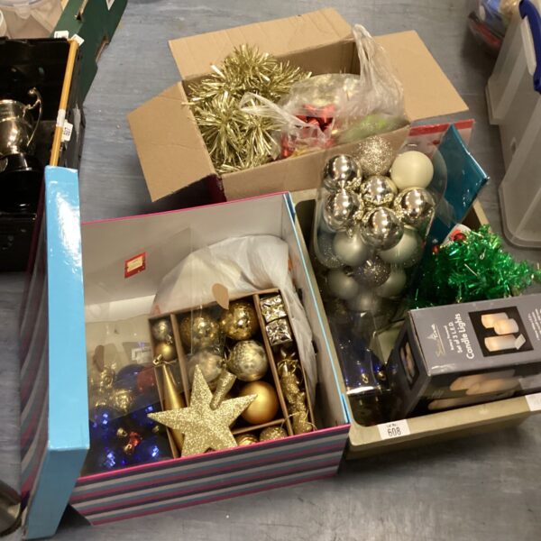 Mixed joblot of colourful Christmas decorations and lights.