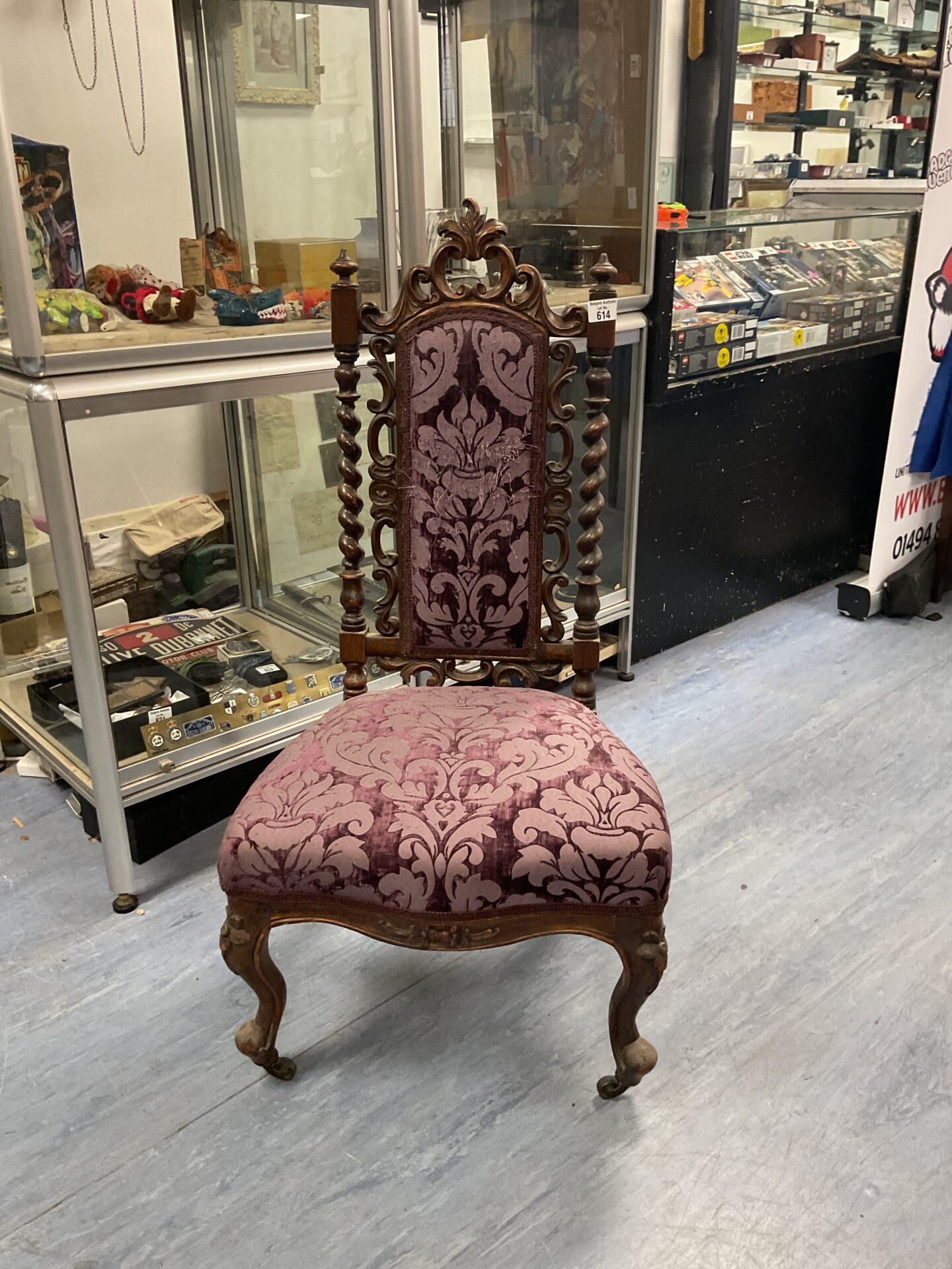614 Antique oak barley twist and carved detail nursing chair on bras casters