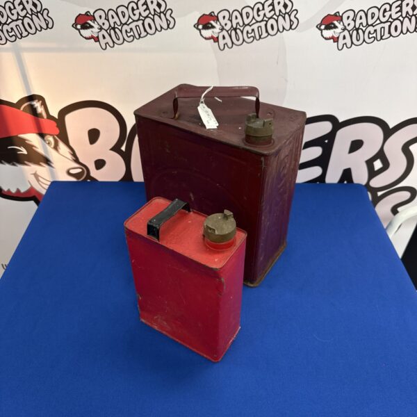 Vintage Esso fuel can and red oil can with brass caps.