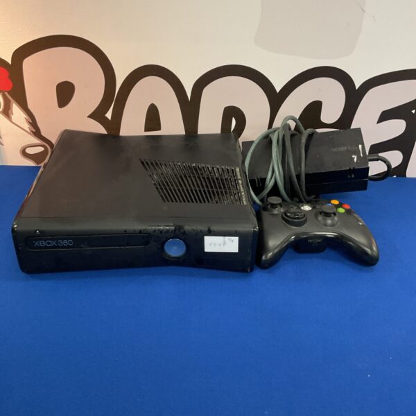 Black Xbox 360 S gaming console with controller and power supply.