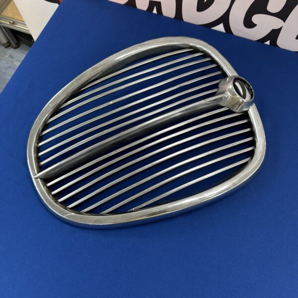 Vintage Jaguar 3.8 S grille with chrome horizontal slats.