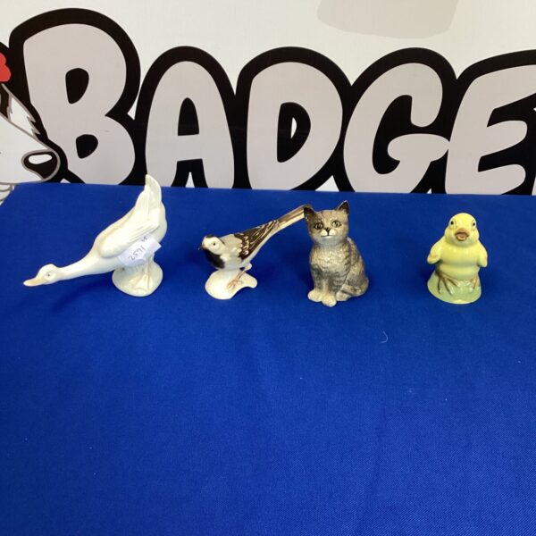Vintage porcelain animal figurines lot including Wade, Goebel & Beswick.