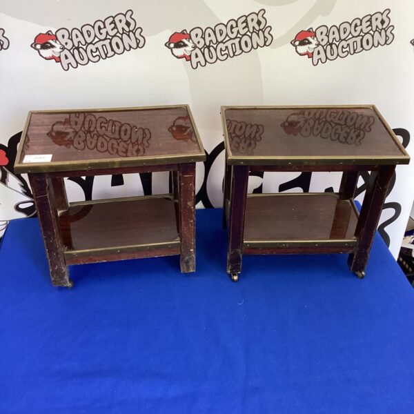 Pair of vintage apprentice drinks trolleys on display.