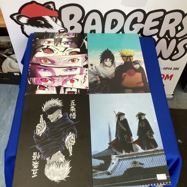 Lot of four metal Displate anime wall art panels.