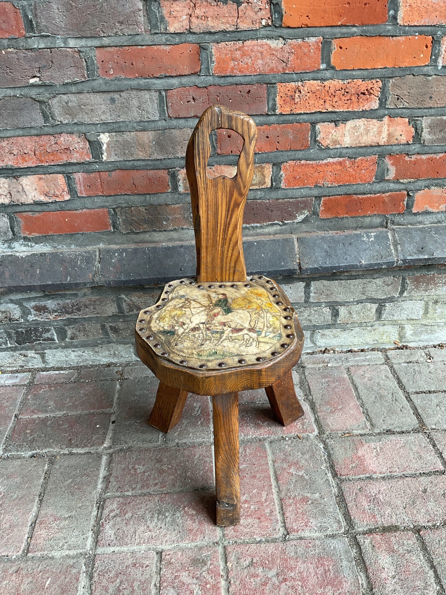 007 Vintage oak milk maids stool with leather hunt scene seat