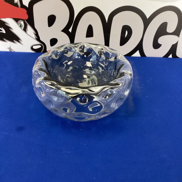 Large clear glass hotel bowl with swirling pattern.