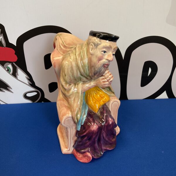 Vintage Mellaware Shylock character jug, detailed pottery collectible.