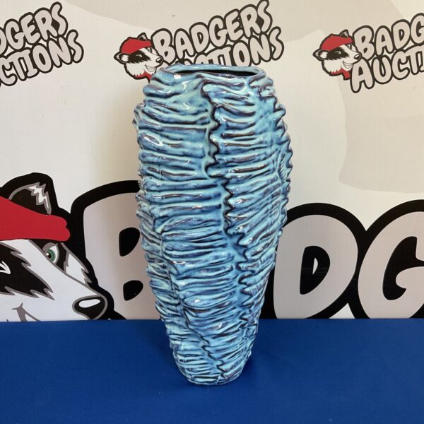 Textured blue studio pottery vase, collectible ceramic art.