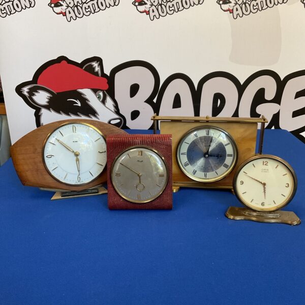 Lot of four vintage mantle clocks, including Smith and Metamec.