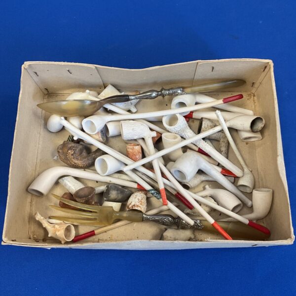 Collection of vintage clay pipes for collectors and enthusiasts.