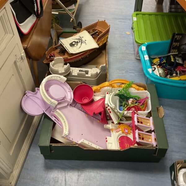 Mixed lot of vintage Playmobile sets and figures for imaginative play.