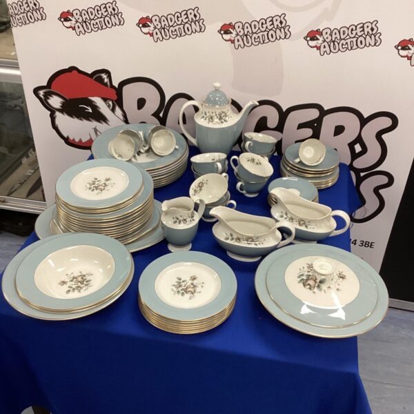 Vintage Royal Doulton Rose Elegans dinner service set on display.