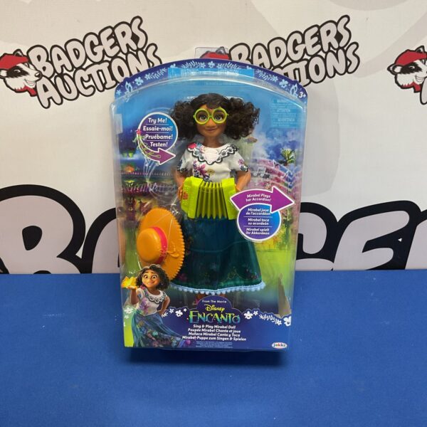 Disney Encanto Mirabel doll with accordion in box.