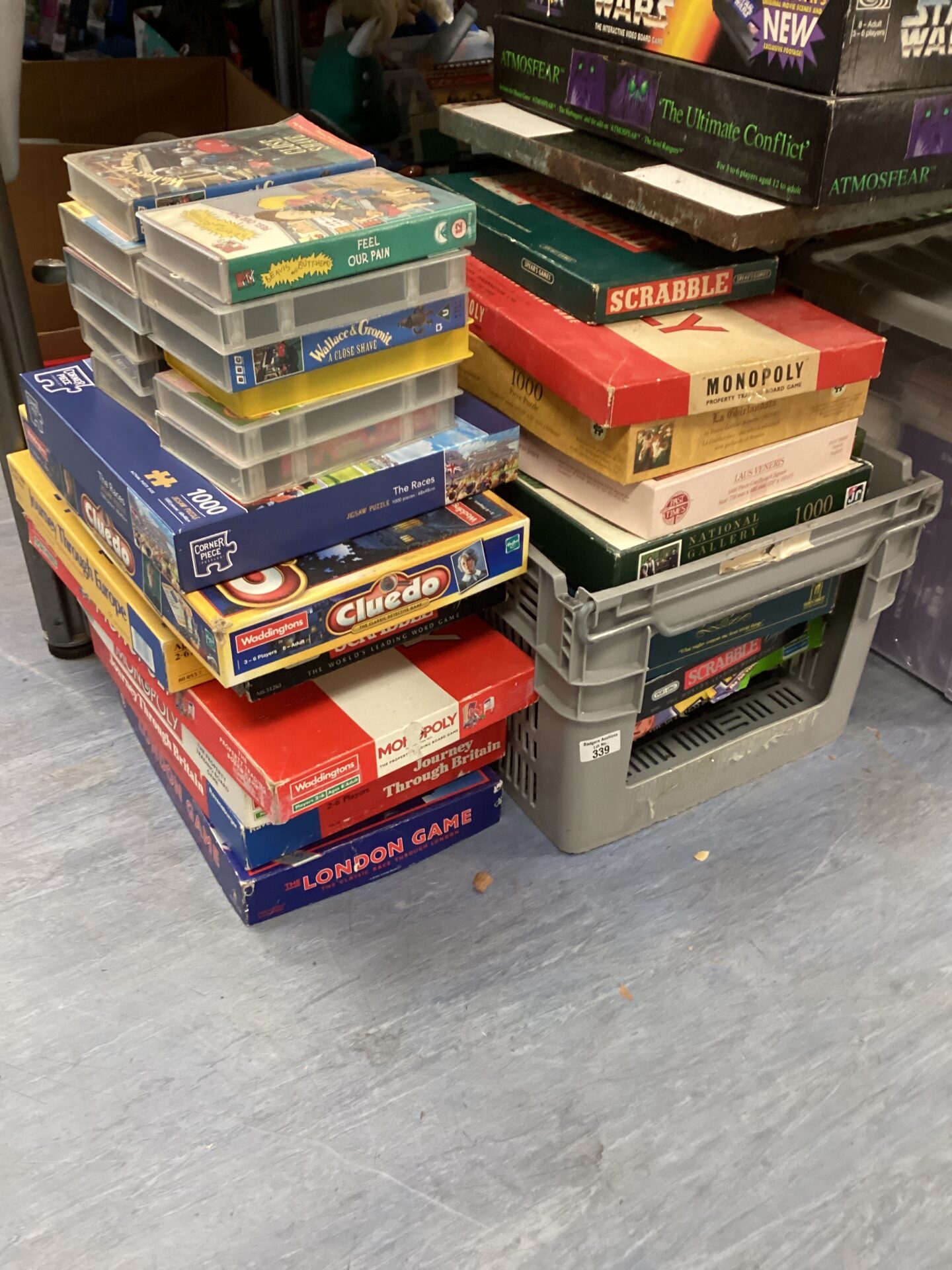 339 Large quantity of board games and videos