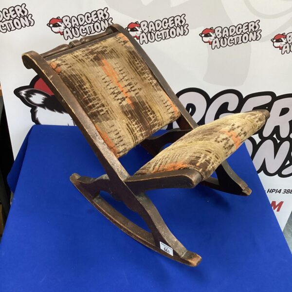 Antique Victorian gout stool from the 1920s with rocking base.