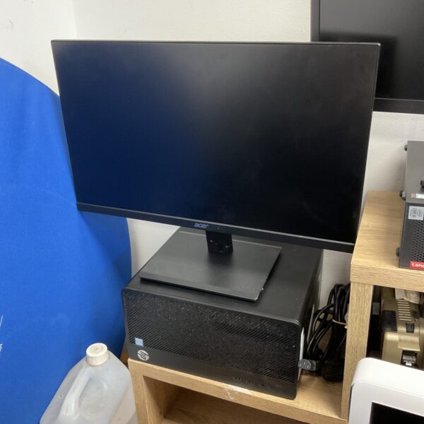 HP Intel Core i7 computer with Acer monitor displayed.