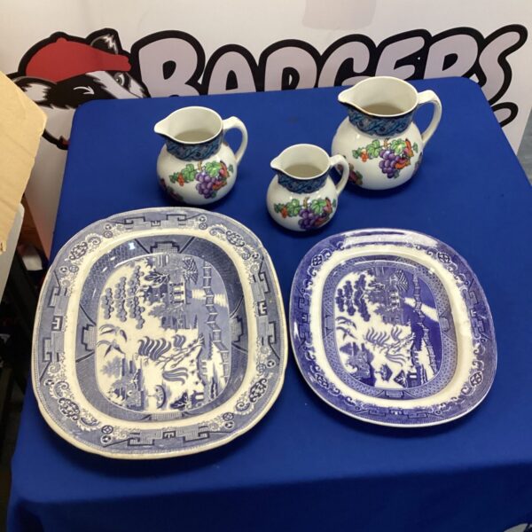 Vintage blue and white china serving plates and Losoware jugs.