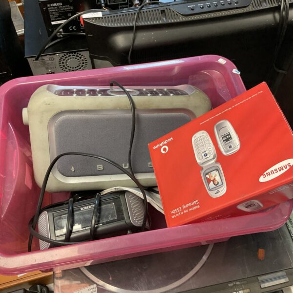 Vintage radio and mobile phone lot including Bush, Roberts and Samsung.