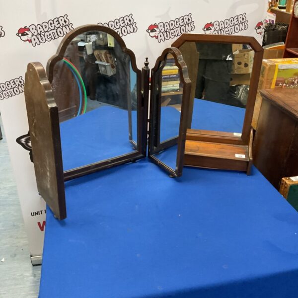 Pair of vintage mahogany dressing table mirrors with elegant frames.