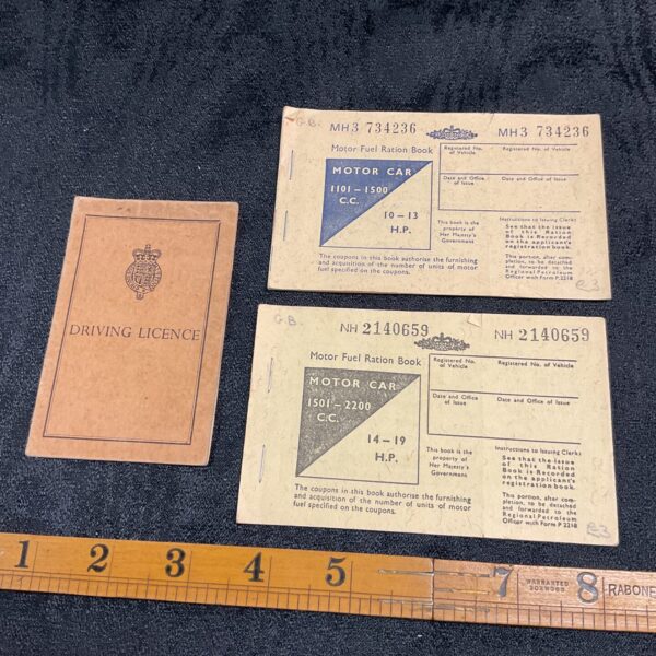 Vintage fuel ration book and driving licence from the 1970s.