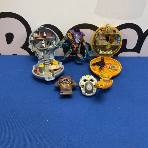 Vintage Mighty Max playsets lot for collectors and 90s toy enthusiasts.