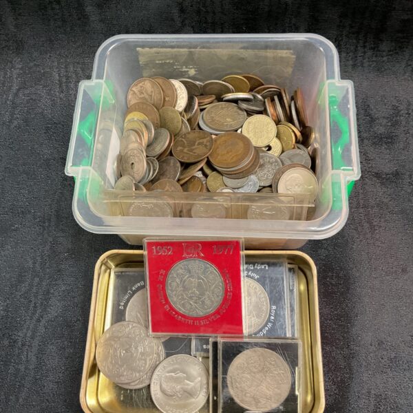 Mixed coin lot featuring a tub and tin of British coins.