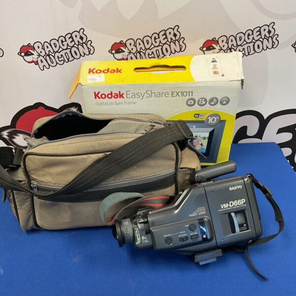 Vintage Sanyo VM-D66P camcorder with Kodak digital photo frame.