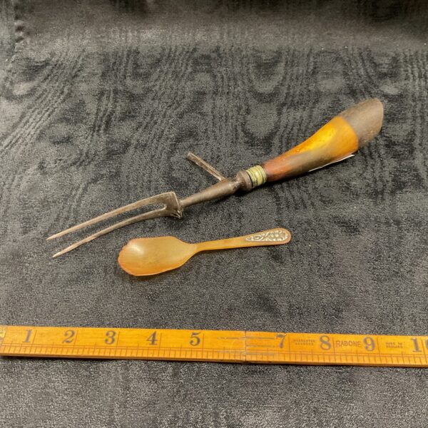 Antique horn carving set with vintage fork and spoon.