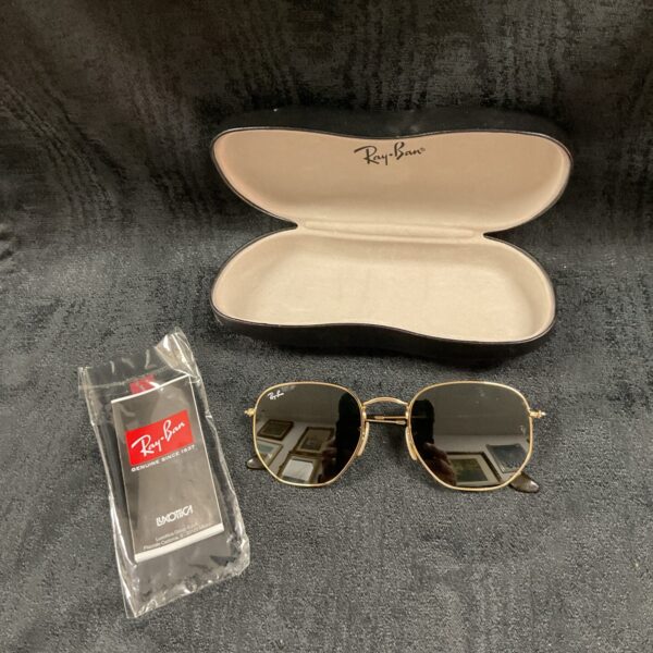 Gold framed Ray Ban aviator sunglasses in original case.