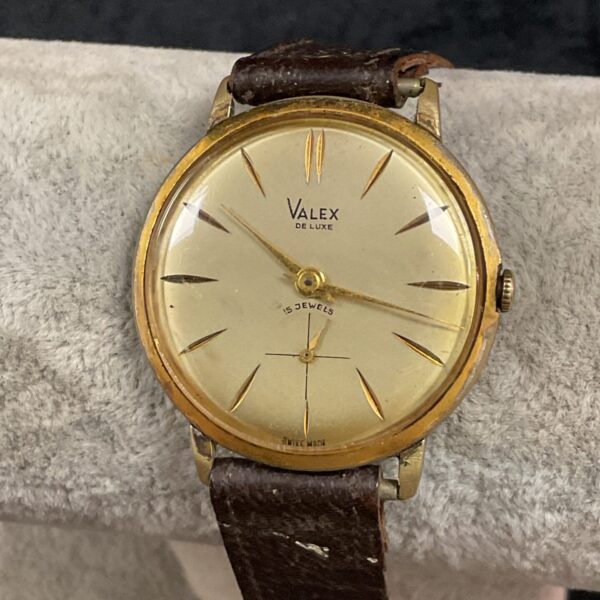 Vintage Valex wristwatch with gold-toned case and dial.