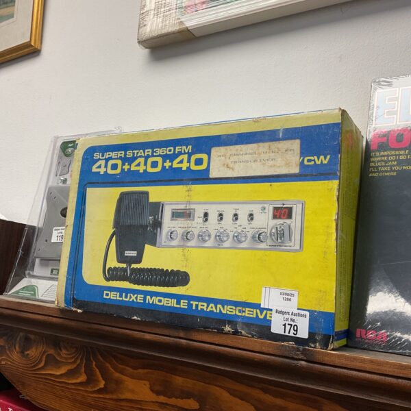 Vintage Superstar 360 CB radio transceiver with front panel controls.