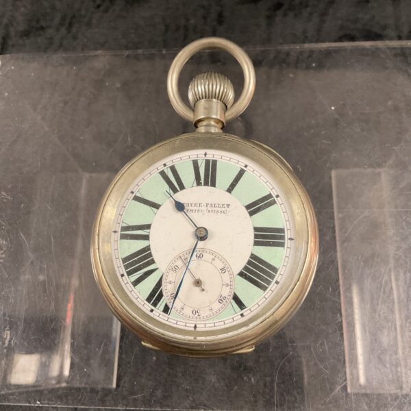 Antique T Favre Fallet pocket watch with white enamel dial.