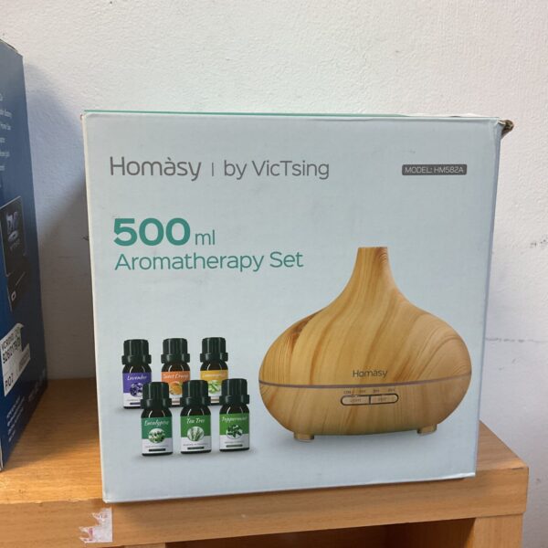 Wood grain Homasy aromatherapy diffuser for essential oils.